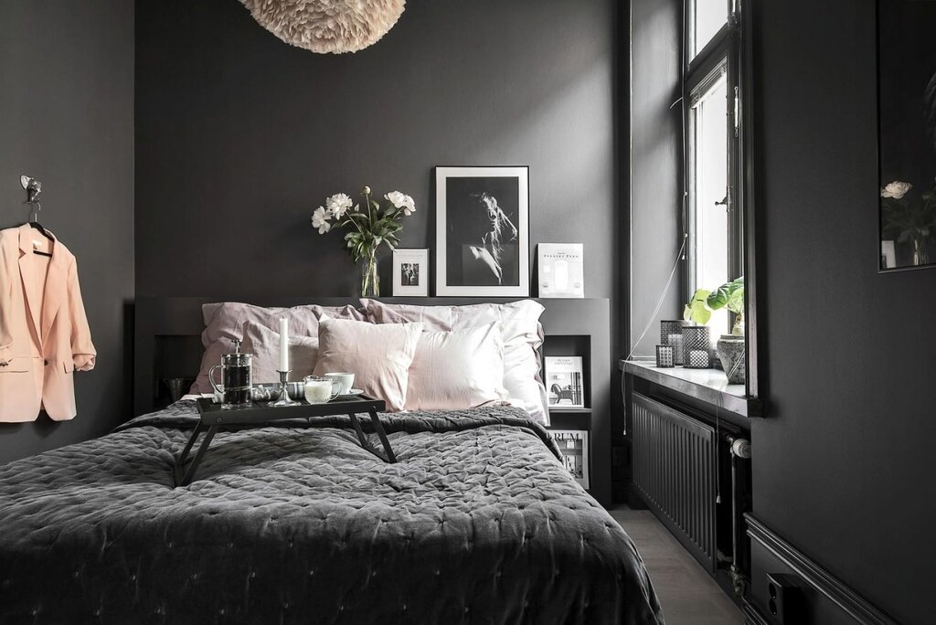 Dark walls in the bedroom interior