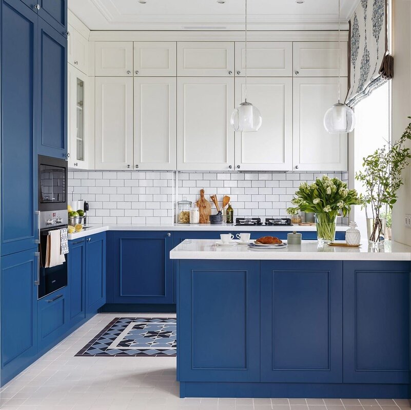 Dark blue kitchen in the interior