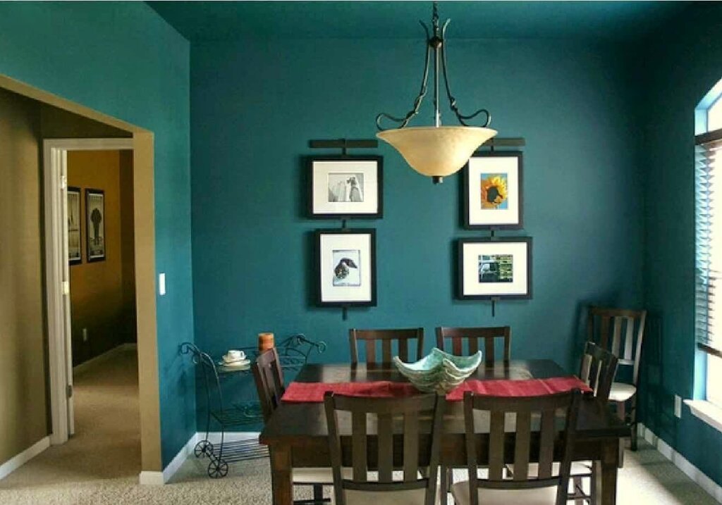 The dark green color of the walls in the interior