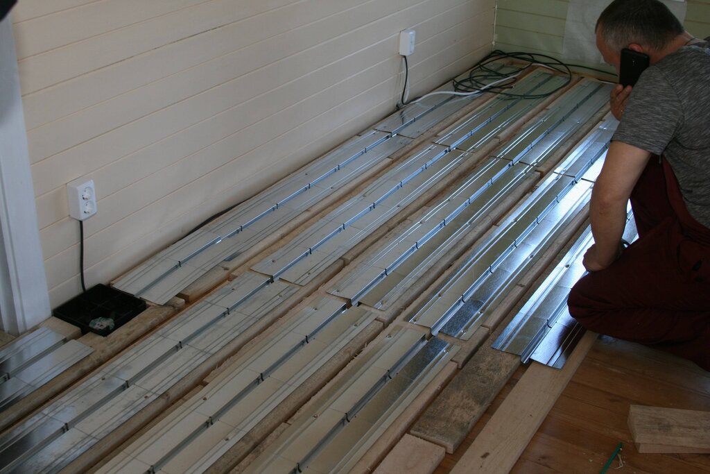 Underfloor heating in a wooden house