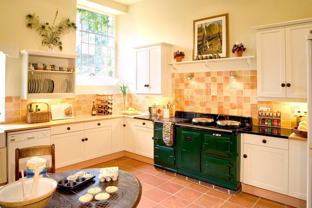 Terracotta floor in the kitchen 17 фото