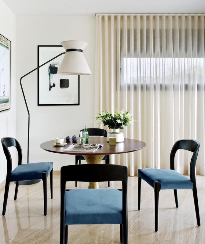 Floor lamp above the dining table