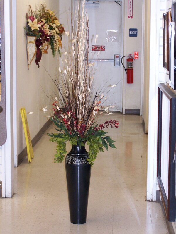 Flowers in a floor vase for the interior