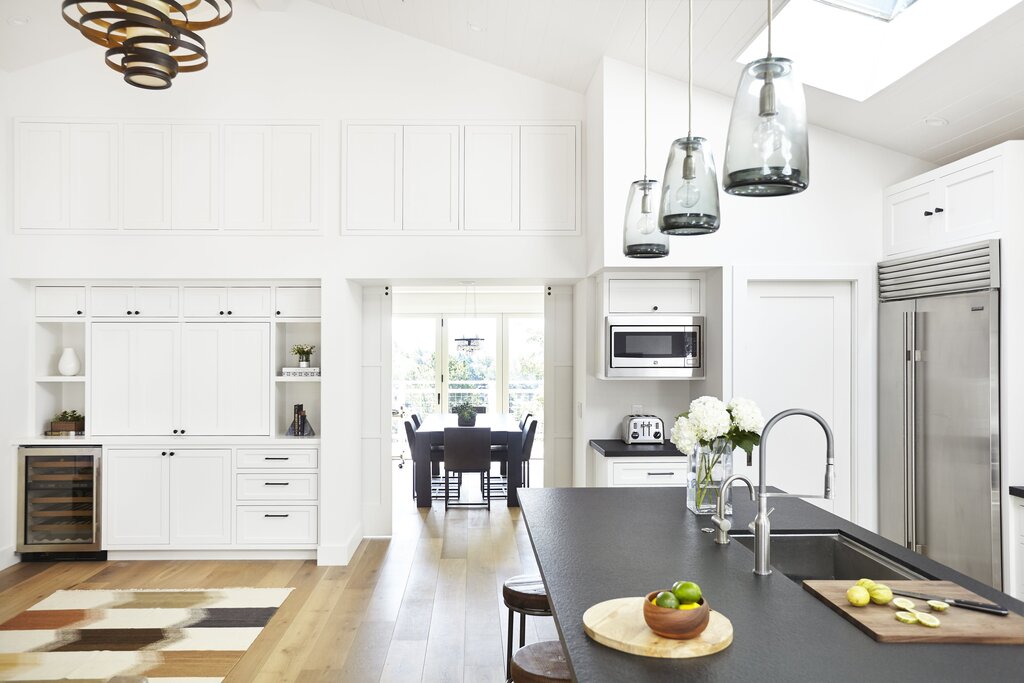 Corner kitchen with high ceilings