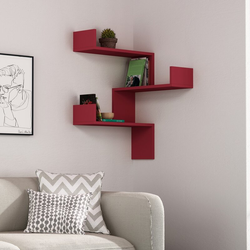 Corner wall-mounted shelf for a room