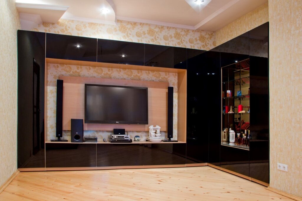 Corner wall unit in the living room with a television