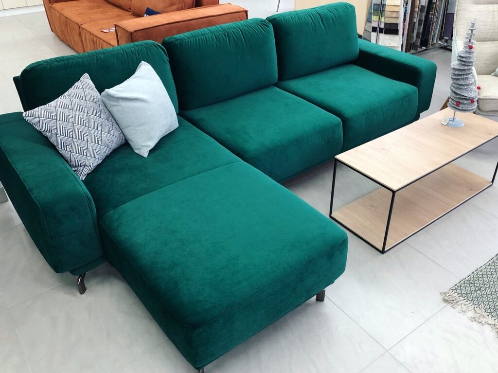 Emerald-colored corner sofa