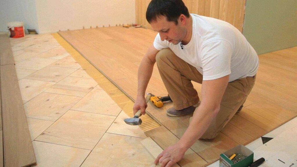 Installing plywood under parquet