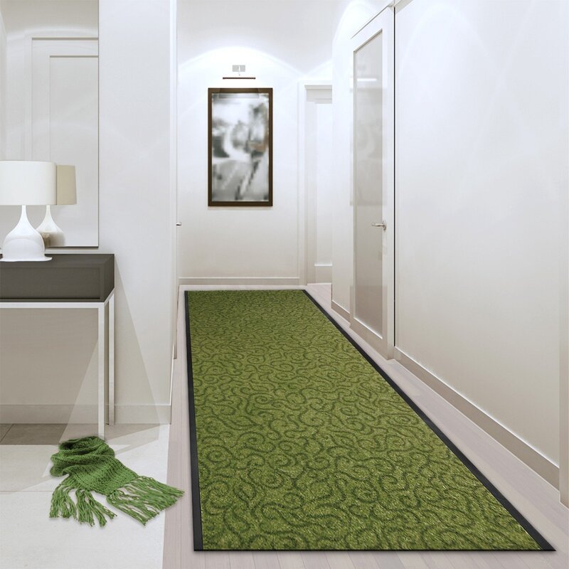 A narrow rug in the hallway