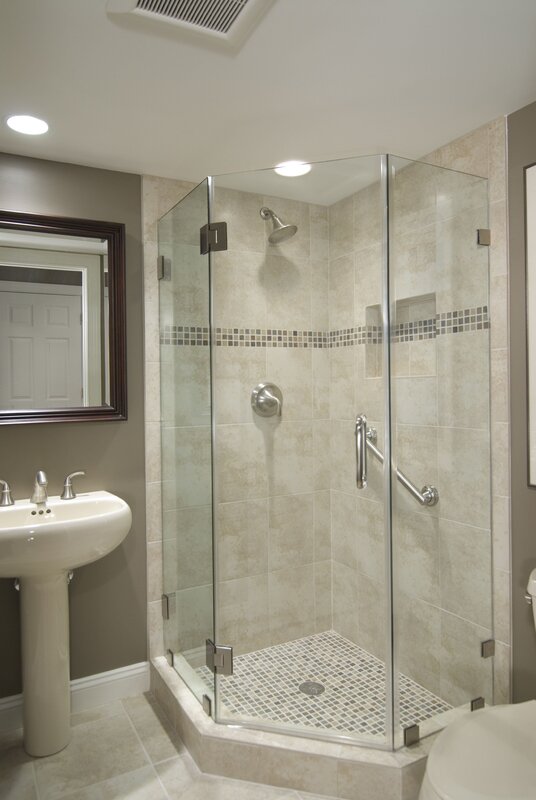 A bathtub with a shower corner