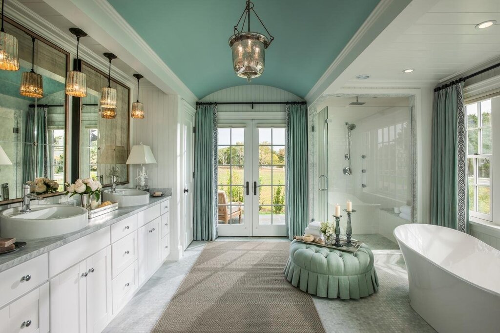 A bathtub by the window in a country house