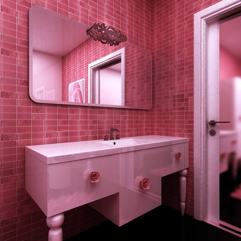 A bathroom in pink tones