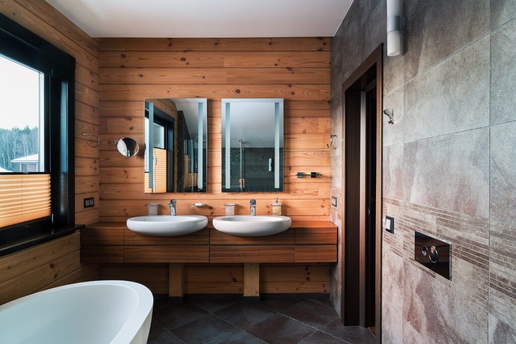 A bathroom with a wooden floor