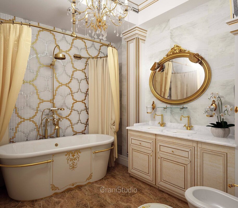 A bathroom with gold faucets