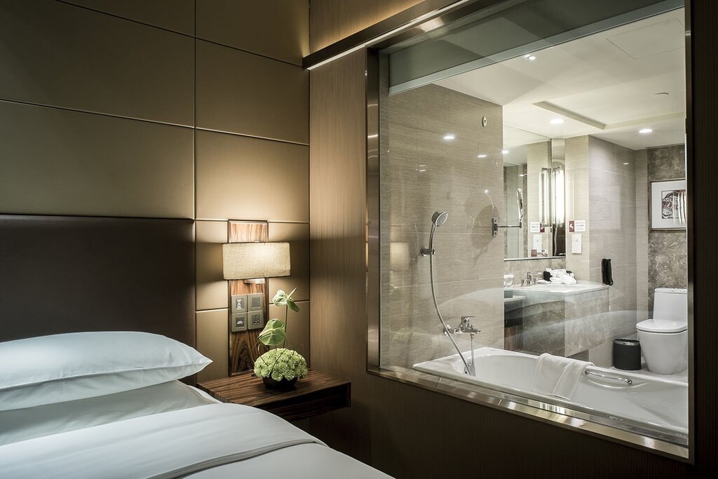 Bathroom with a glass partition