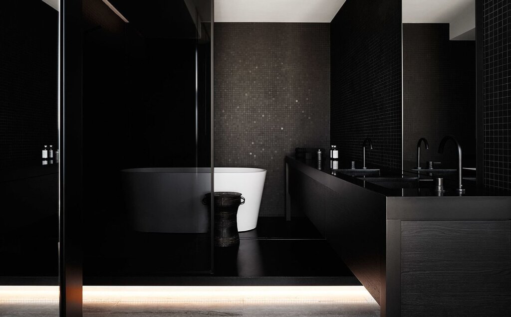 Bathroom with a black toilet