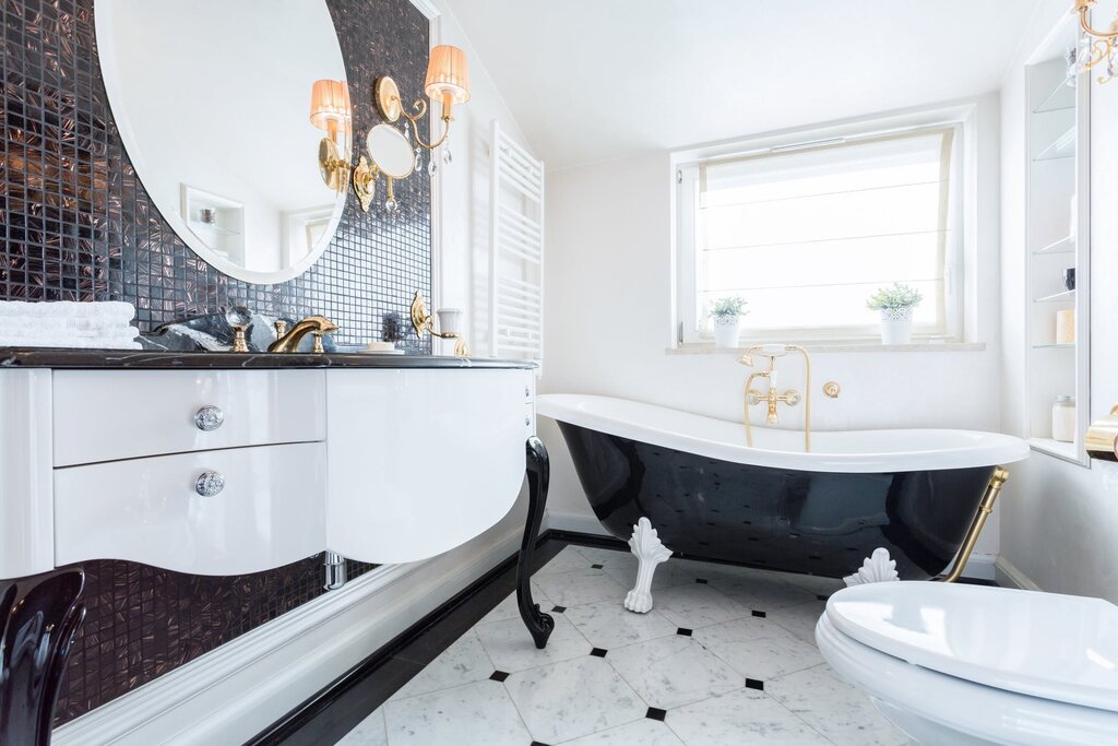 A bathroom with black accents