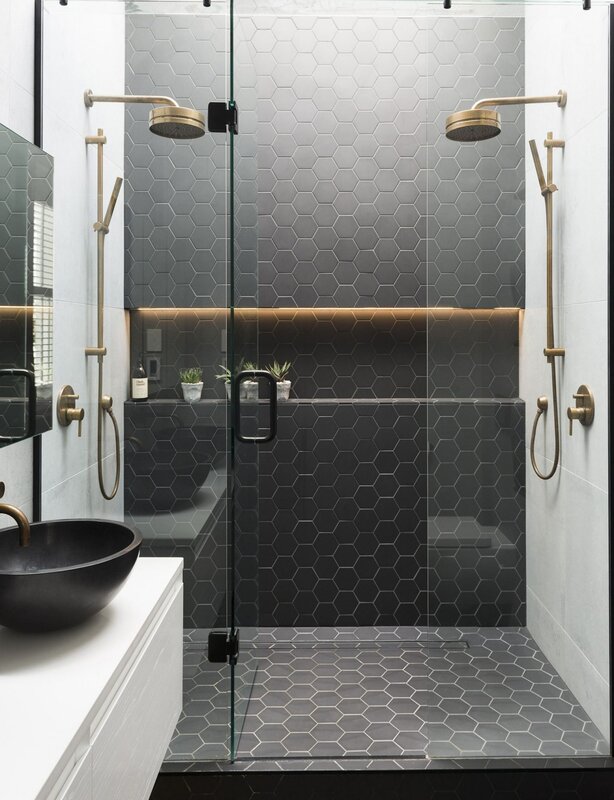 Bathroom with a shower tray