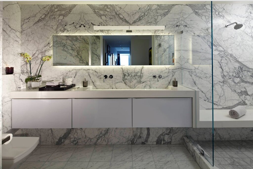 A bathroom with marble tiles