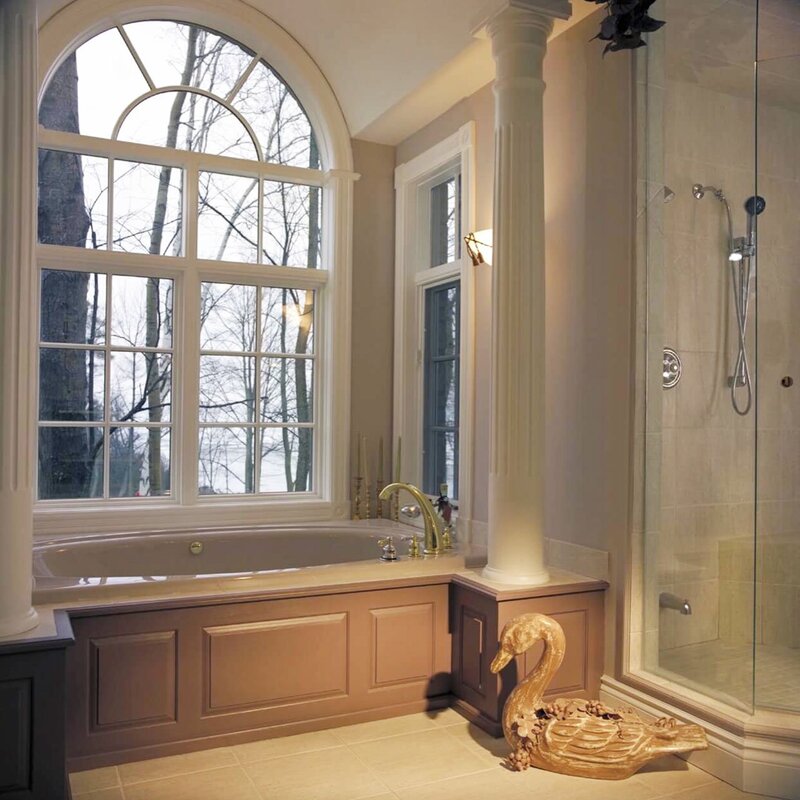 A bathroom with a window in a Stalin-era building