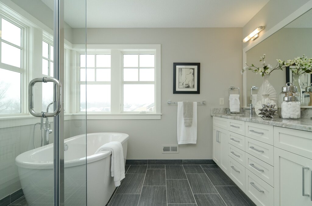 The bathroom with a gray floor