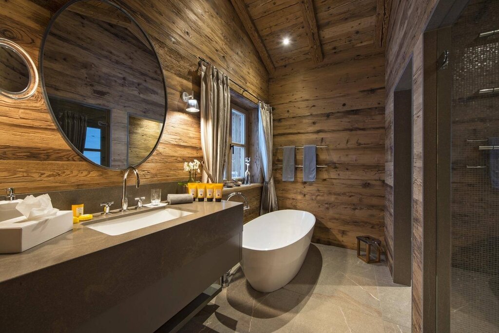 A bathroom in a wooden style