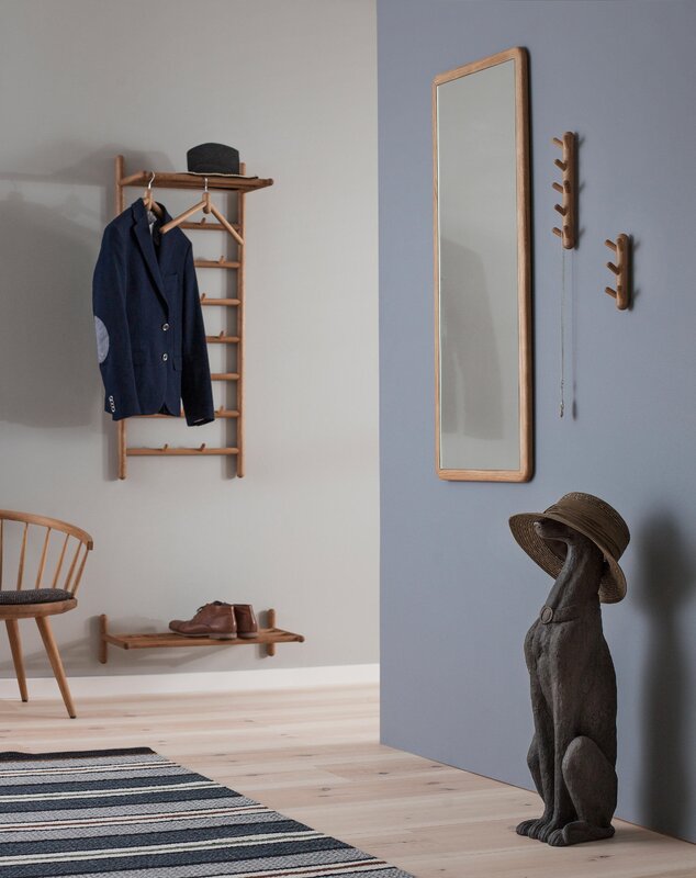 A coat rack for a small hallway