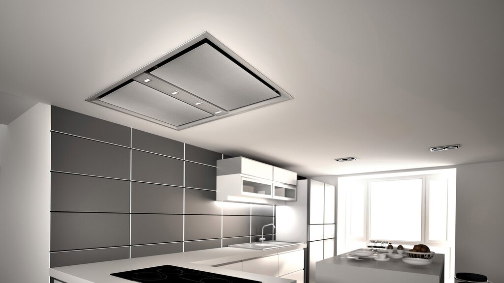 Range hood in the stretch ceiling in the kitchen