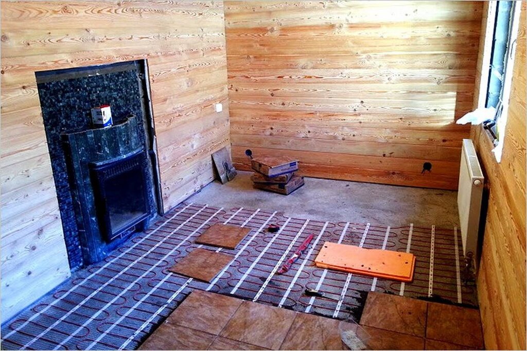 Water-based underfloor heating in the sauna