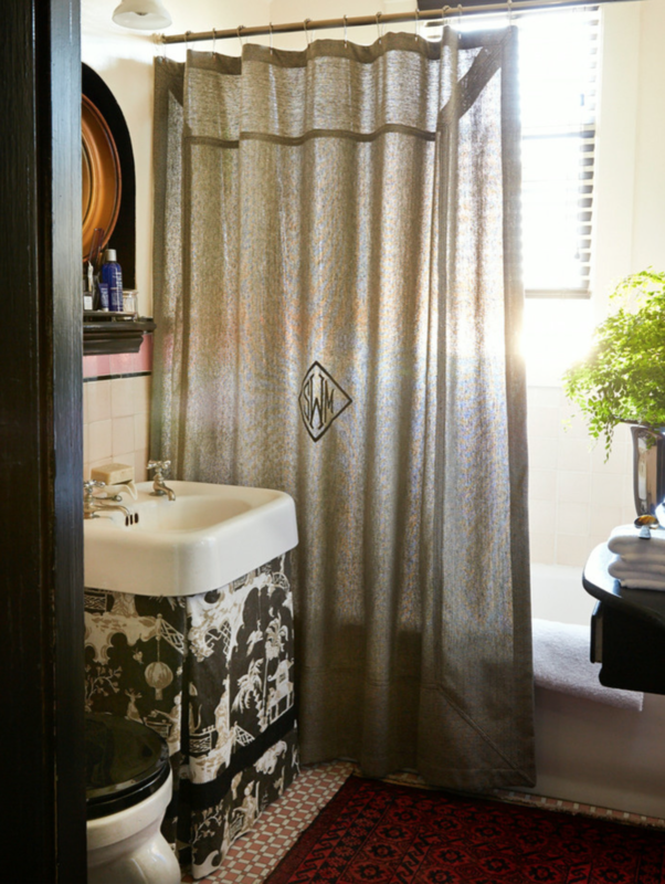 A curtain for the sink in the bathroom