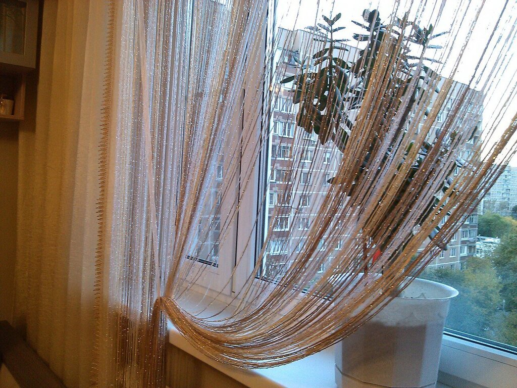 Curtains with tassels for the window