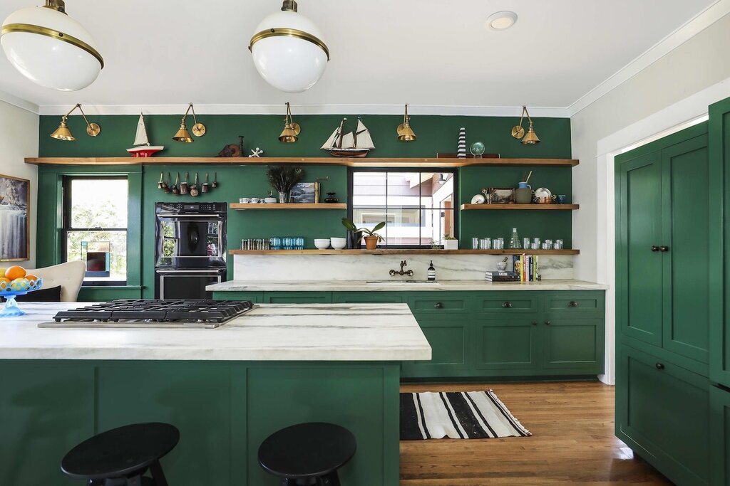 Green kitchen without upper cabinets