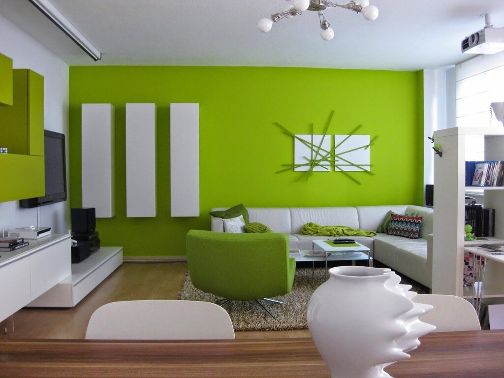 Green wallpaper in the living room interior