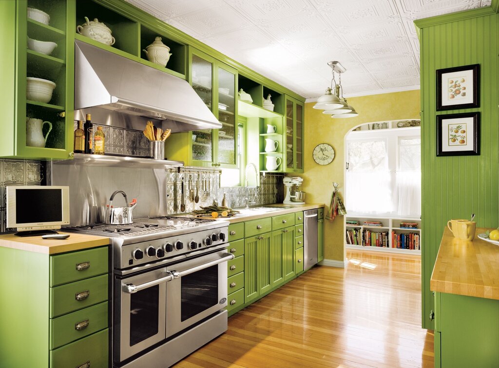 Green wallpaper in the kitchen interior