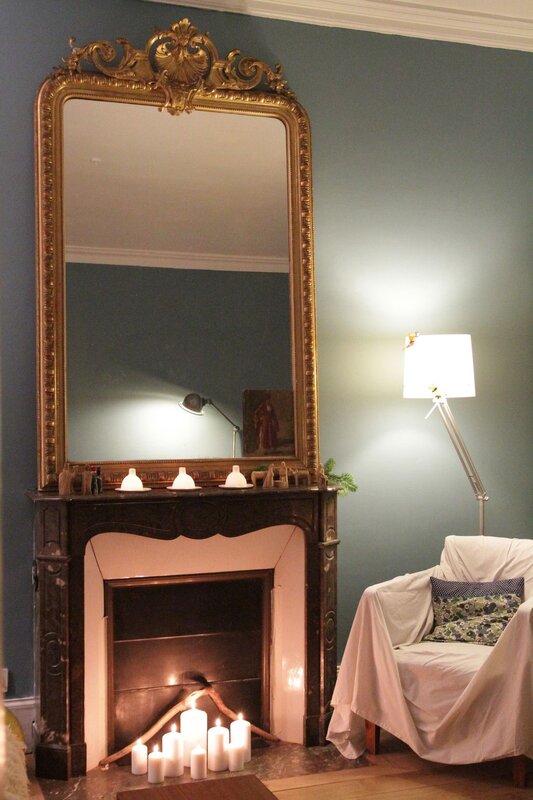 Mirror above the fireplace in the interior