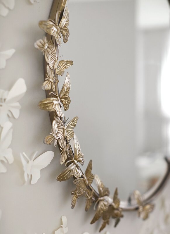 Wall mirror with butterflies