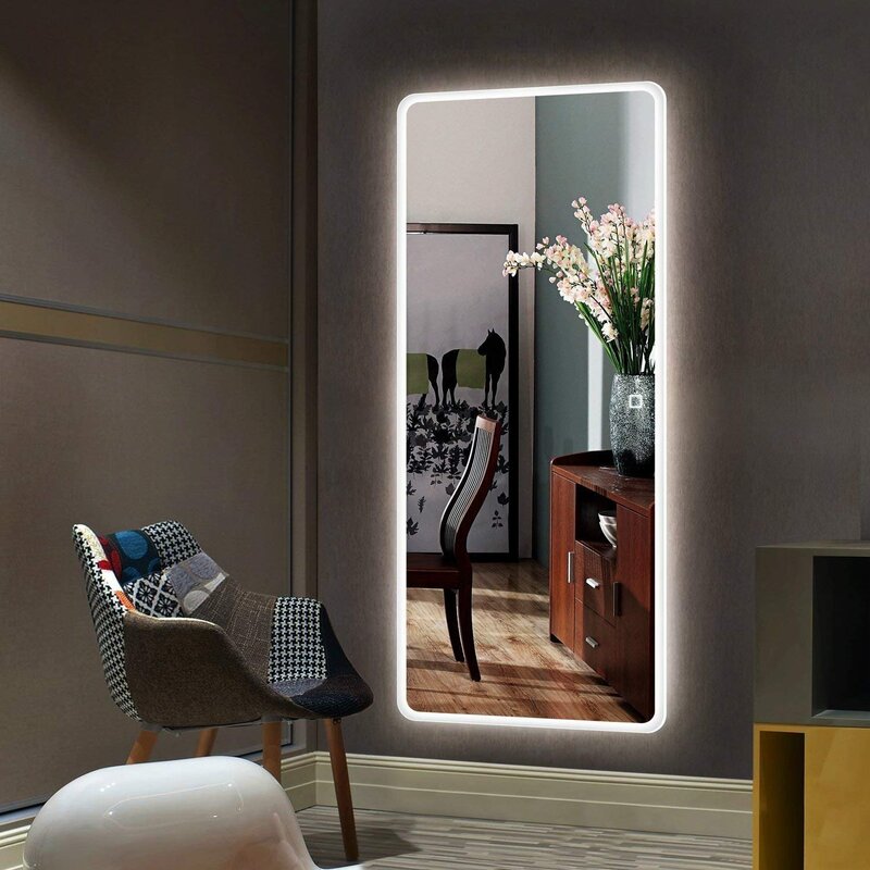 Wall mirror in the hallway with lighting