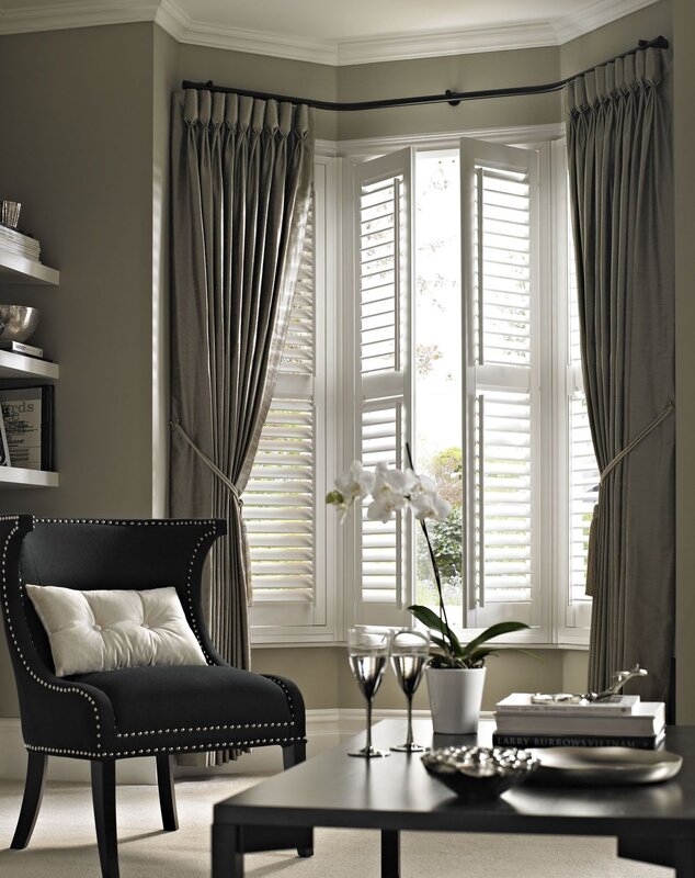 Blinds with curtains in the interior