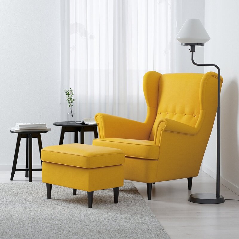 A yellow Ikea armchair in the interior