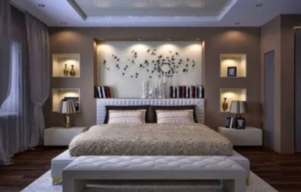 The area above the bed in the bedroom